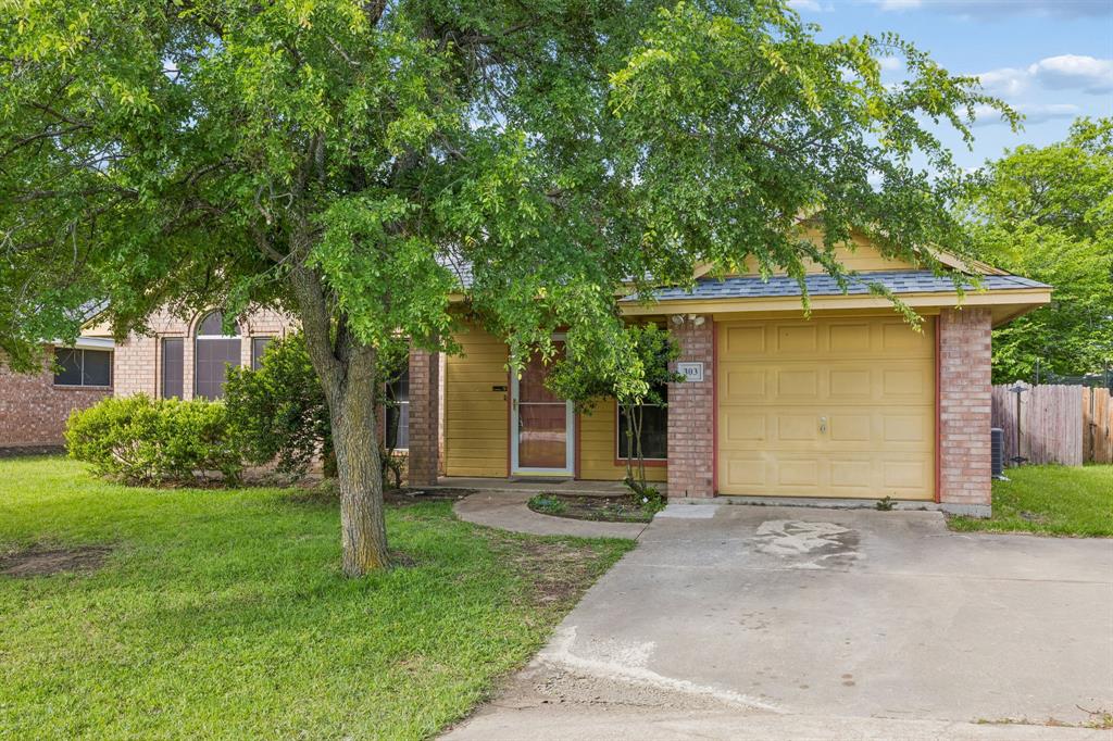 303 Vista Ridge Drive Venus, TX 76084 - Photo 3 of 25 front view of a house with a yard