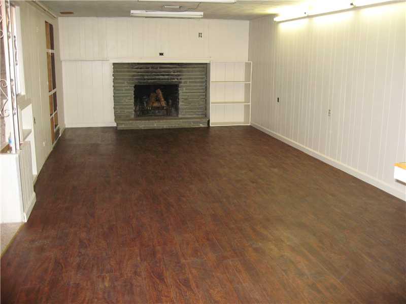 1582 Bellmonte Road Franklin Park, PA 15237 - Photo 15 of 20 Family Room. Huge family room with brand new flooring and a second fireplace!