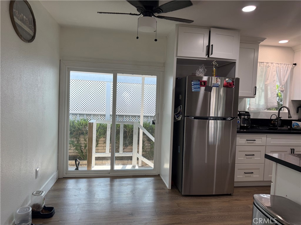 227 Palos Verdes Drive Santa Ana, CA 92704 - Photo 17 of 41 a kitchen with stainless steel appliances granite countertop a refrigerator a sink and a stove