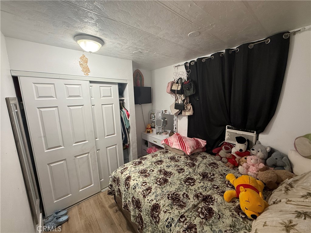 227 Palos Verdes Drive Santa Ana, CA 92704 - Photo 22 of 41 a bed room with a bed and a closet
