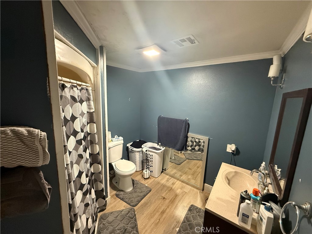 227 Palos Verdes Drive Santa Ana, CA 92704 - Photo 26 of 41 a living room with furniture and a window