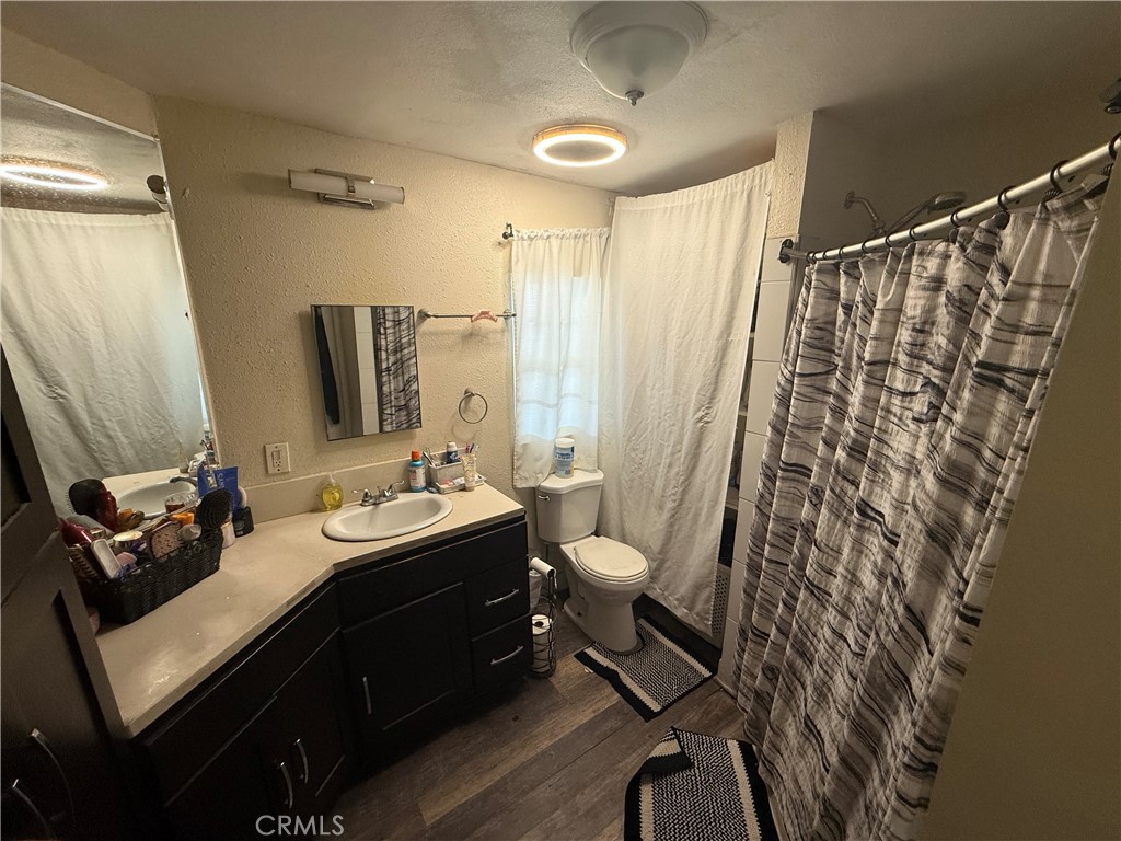 227 Palos Verdes Drive Santa Ana, CA 92704 - Photo 36 of 41 a bathroom with a sink and a mirror