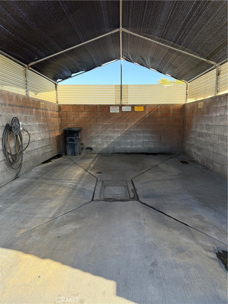 227 Palos Verdes Drive Santa Ana, CA 92704 - Photo 39 of 41 a blue umbrella sitting in the middle of a building