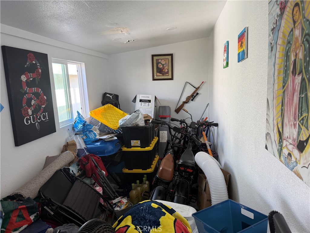 227 Palos Verdes Drive Santa Ana, CA 92704 - Photo 40 of 41 a living room with furniture and a wooden floor