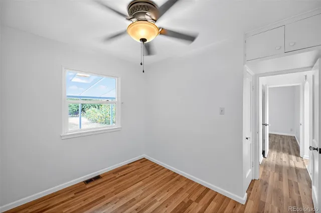 an empty room and wooden floor
