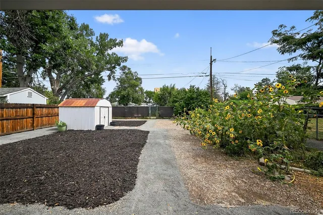 a view of a house with a street
