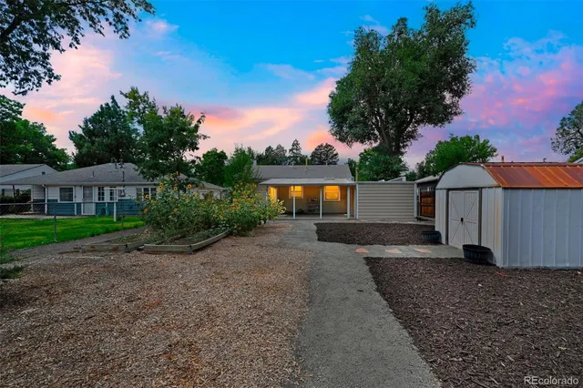 a view of a back yard with a house