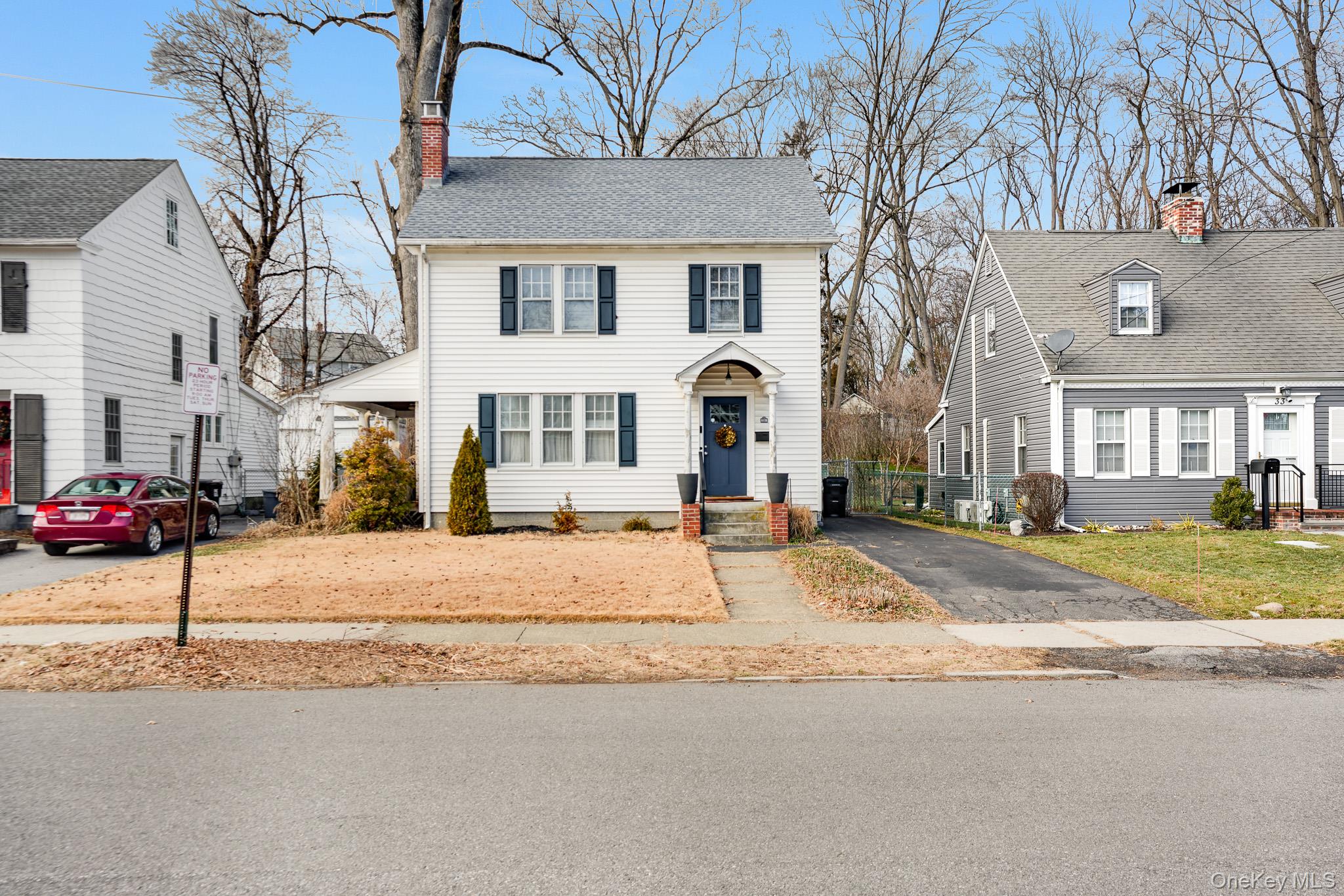 a view of a house with a street