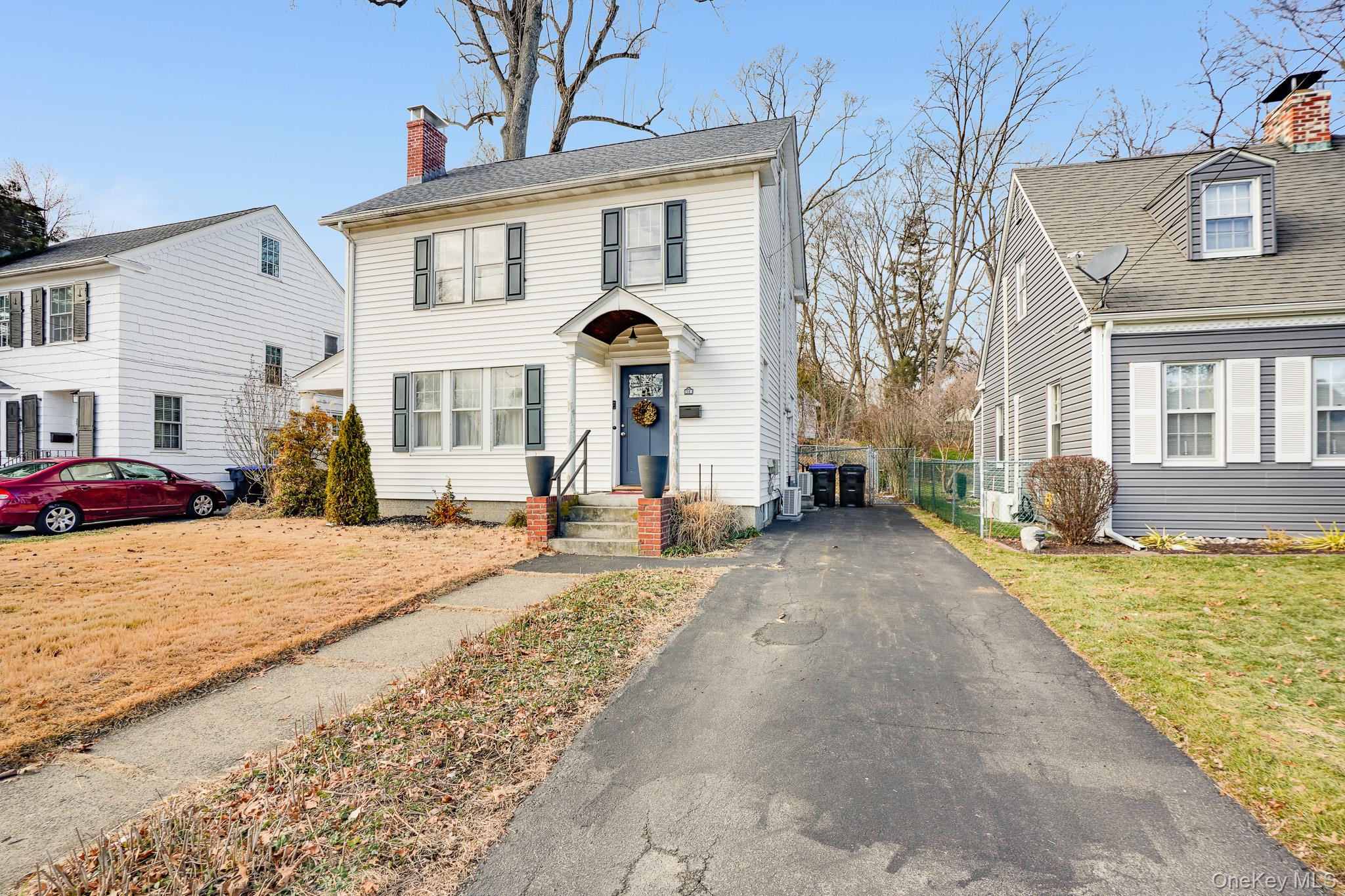 31 Wilson Boulevard Poughkeepsie, NY 12603 - Photo 2 of 36 a front view of a house with a yard