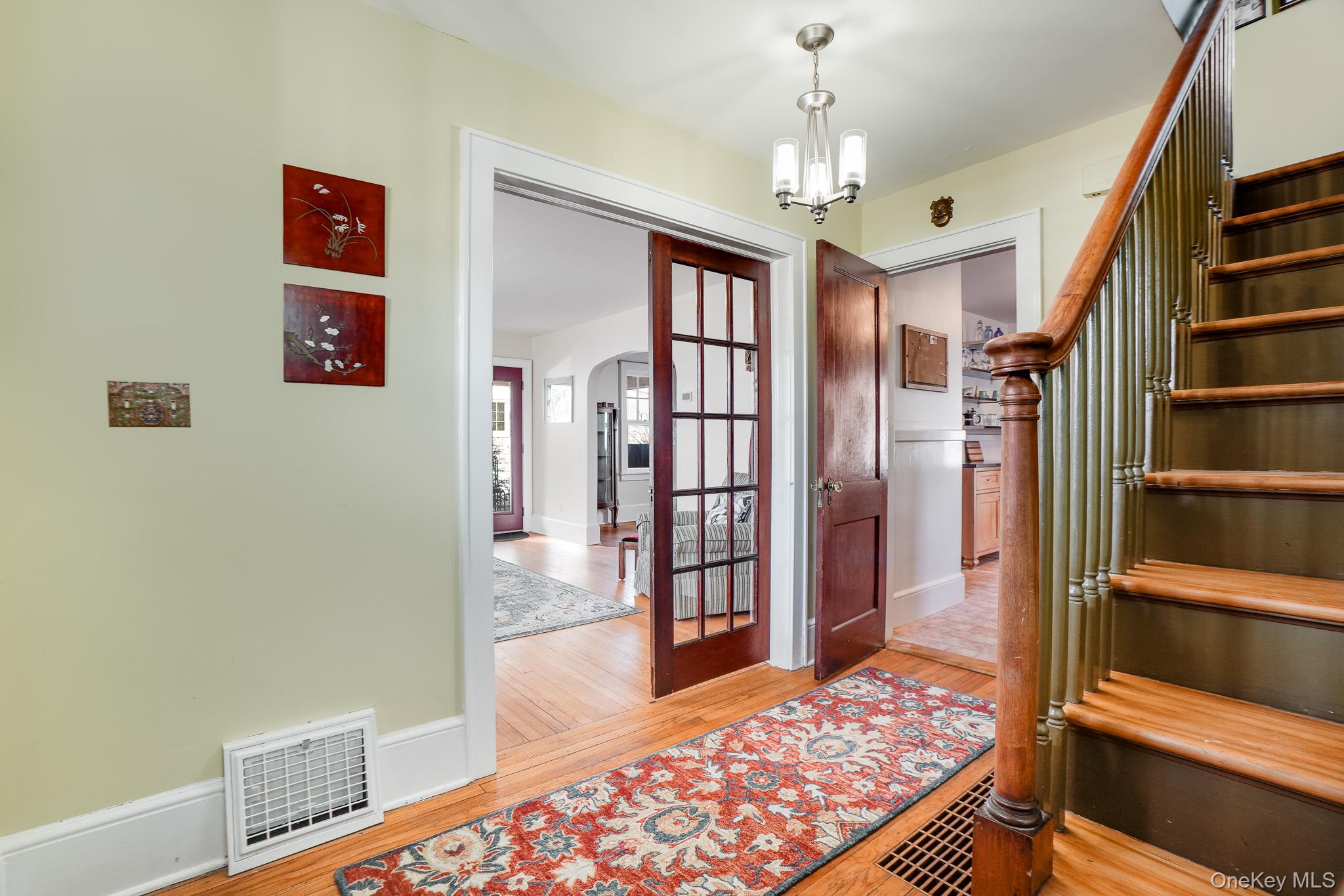 31 Wilson Boulevard Poughkeepsie, NY 12603 - Photo 3 of 36 a bedroom with furniture and a chandelier
