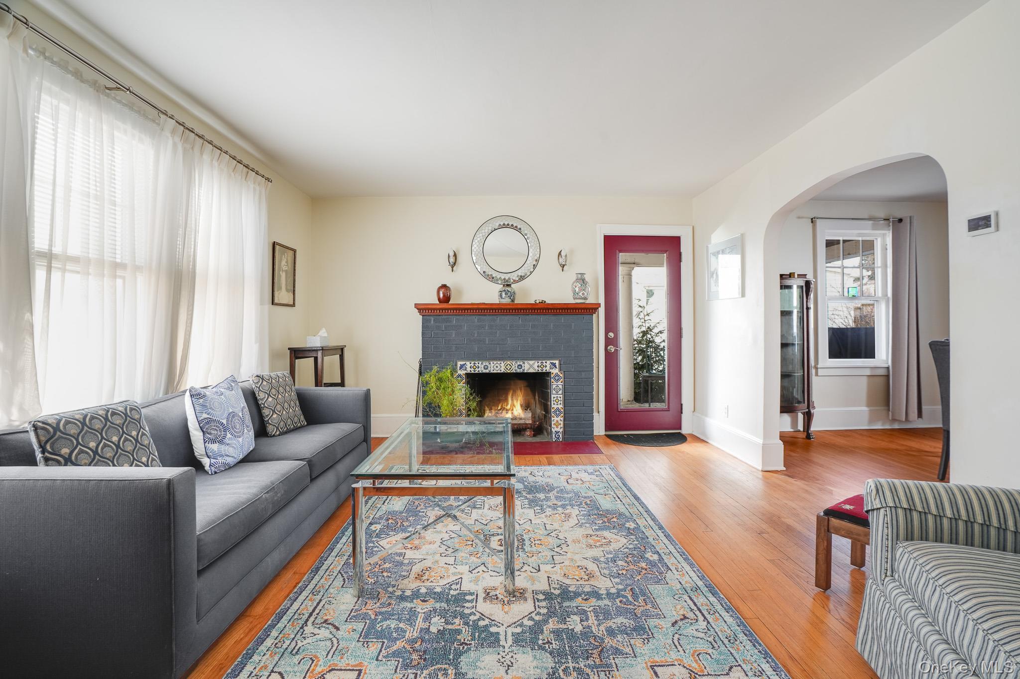 31 Wilson Boulevard Poughkeepsie, NY 12603 - Photo 6 of 36 a living room with furniture and a fireplace