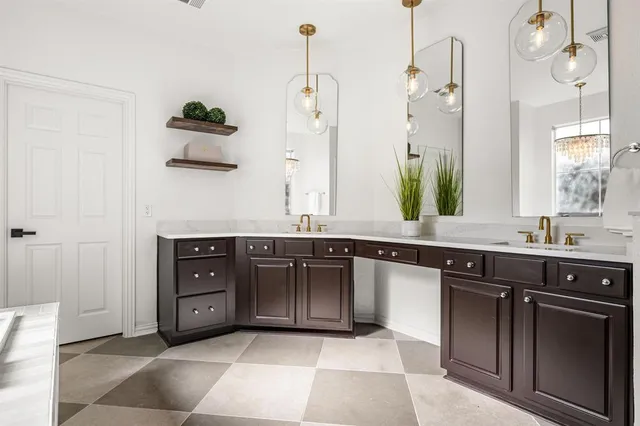 a kitchen with a sink and a stove