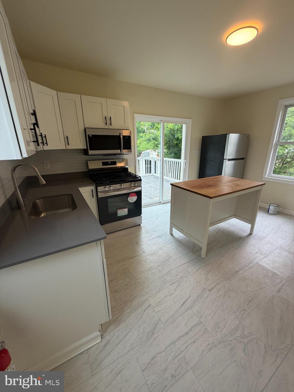 136 Webster Street Riverside, NJ 08075 - Photo 7 of 18 Kitchen leading to deck