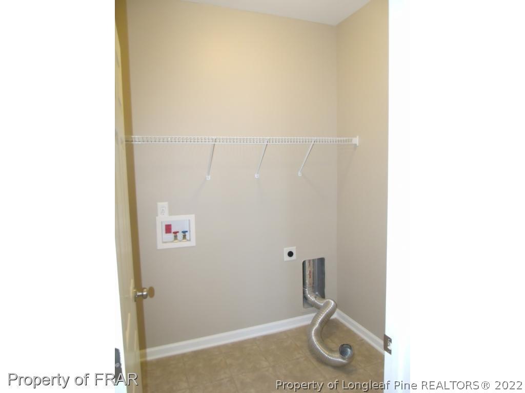 1448 Rough Rider Lane Parkton, NC 28371 - Photo 15 of 36 a bathroom with a shower