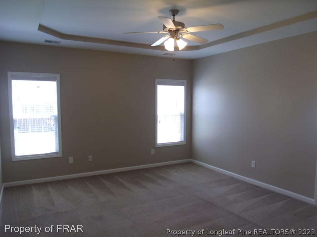 1448 Rough Rider Lane Parkton, NC 28371 - Photo 16 of 36 an empty room with a window