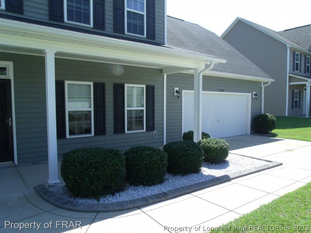 1448 Rough Rider Lane Parkton, NC 28371 - Photo 3 of 36 a view of a house with potted plants