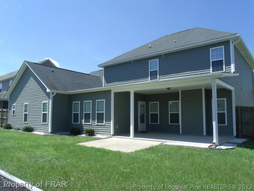 1448 Rough Rider Lane Parkton, NC 28371 - Photo 36 of 36 front view of a house with a yard