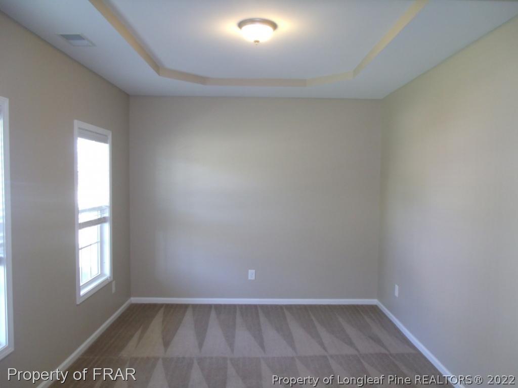 1448 Rough Rider Lane Parkton, NC 28371 - Photo 5 of 36 an empty room with a window