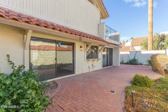 a view of a garden with a patio