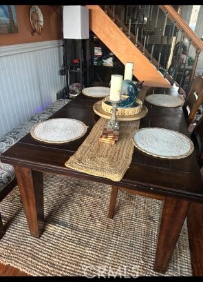 5246 St George Road Westminster, CA 92683 - Photo 6 of 16 a table and chairs in a patio