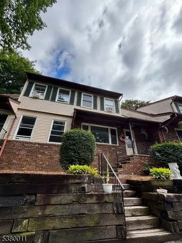 a front view of house with yard