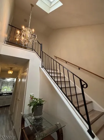 a view of a hallway and dining room