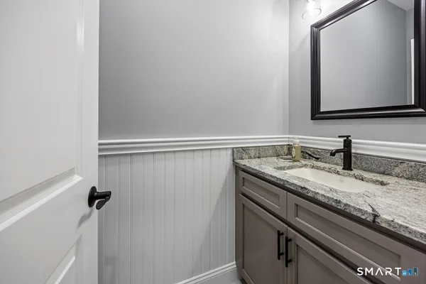 a view of a sink and mirror