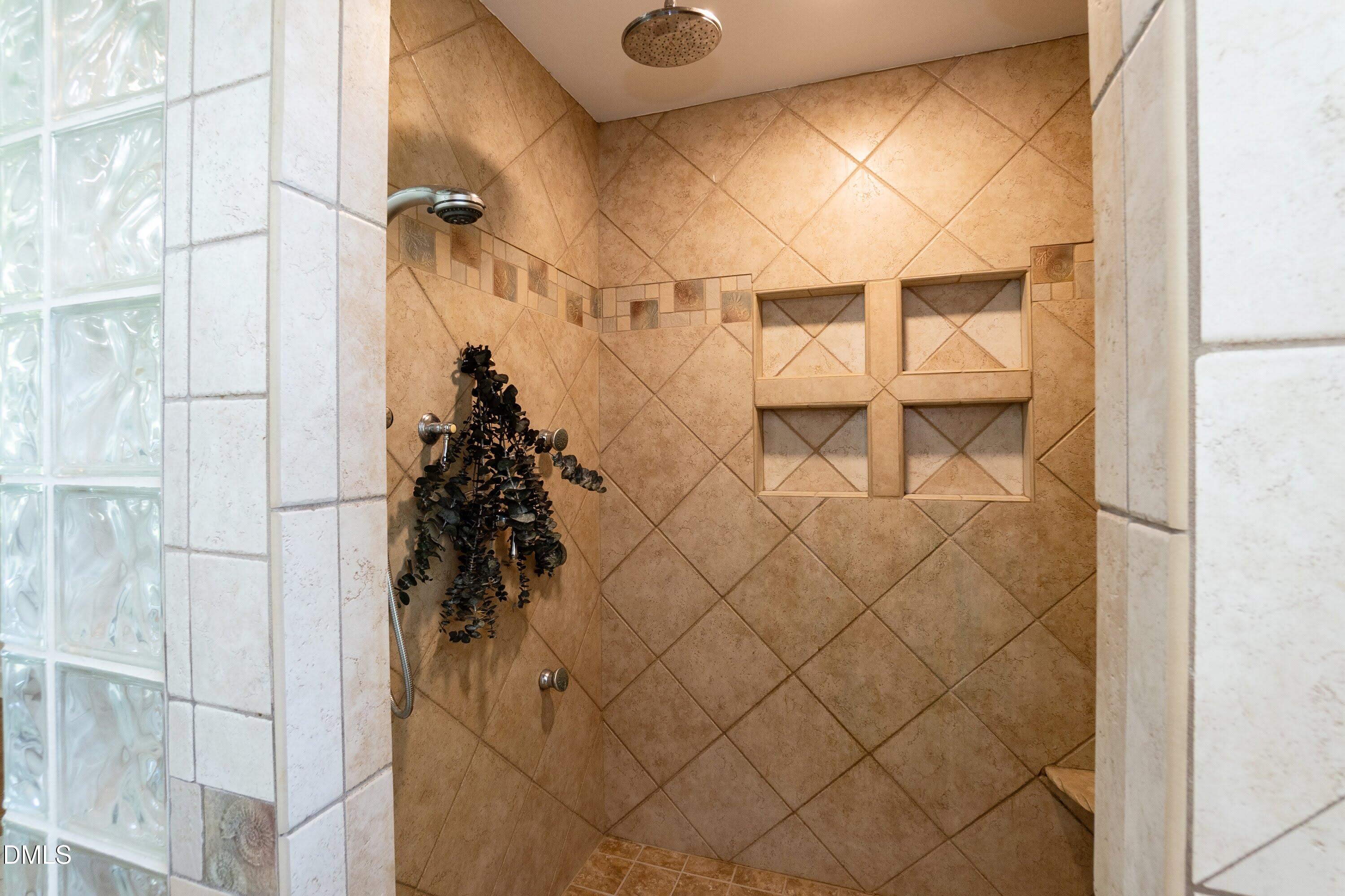 641 Rocky Ford Road Louisburg, NC 27549 - Photo 19 of 38 a bathroom with a shower