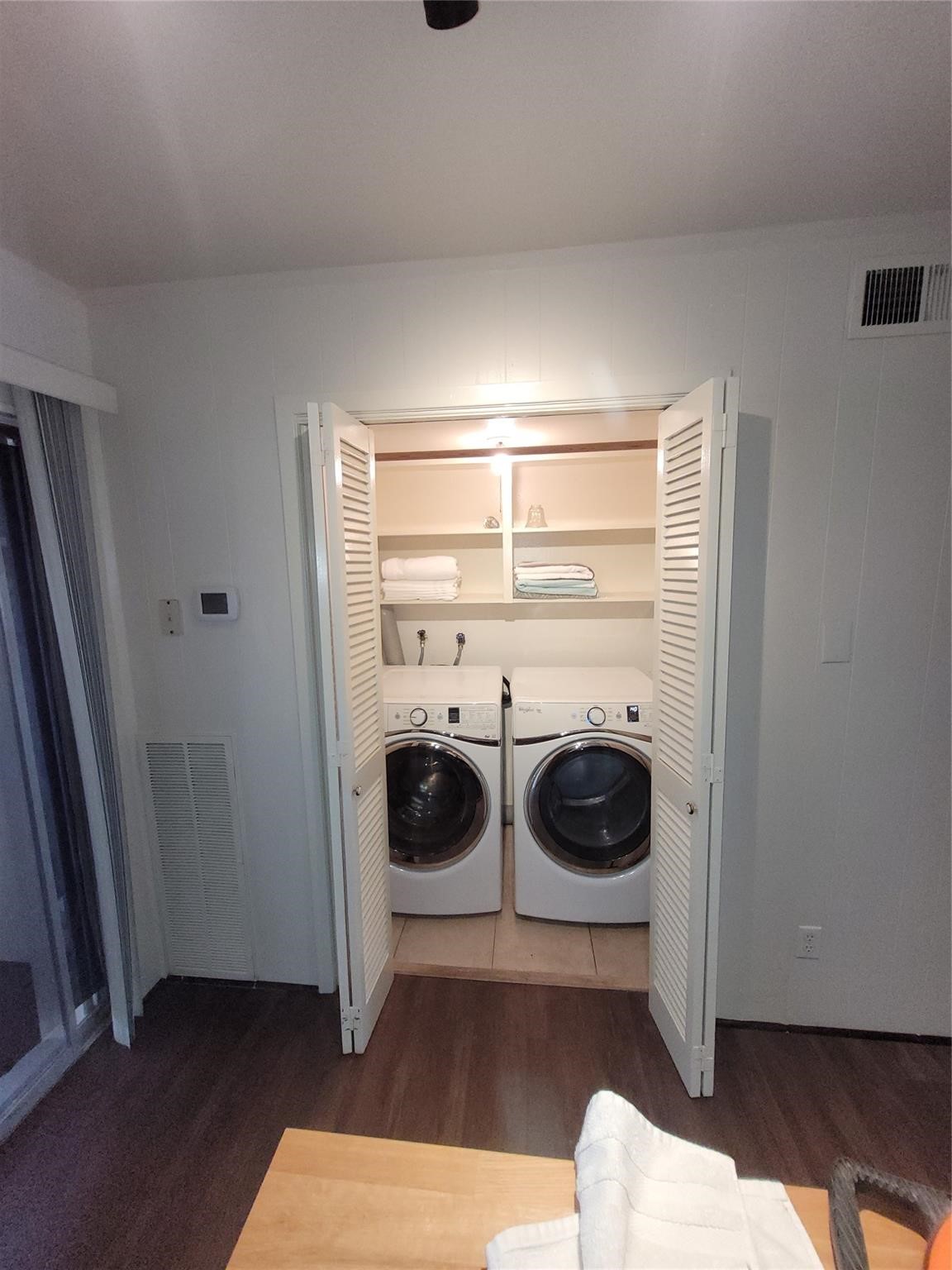 7213 Beechnut Street Houston, TX 77074 - Photo 9 of 12 a utility room with dryer and washer