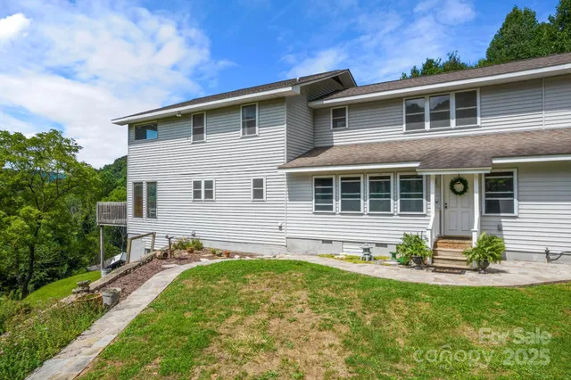 front view of a house with a garden