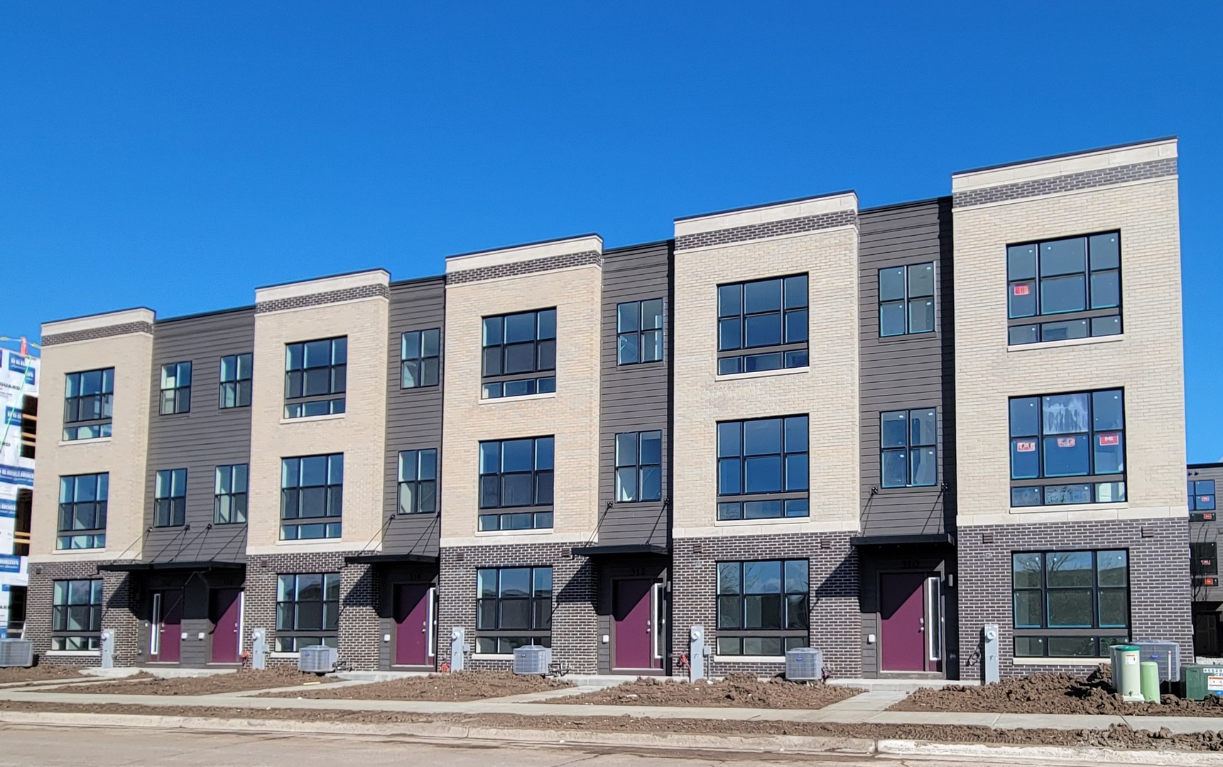 338 Summit Circle Lombard, IL 60148 - Photo 2 of 35 a front view of a building with street view