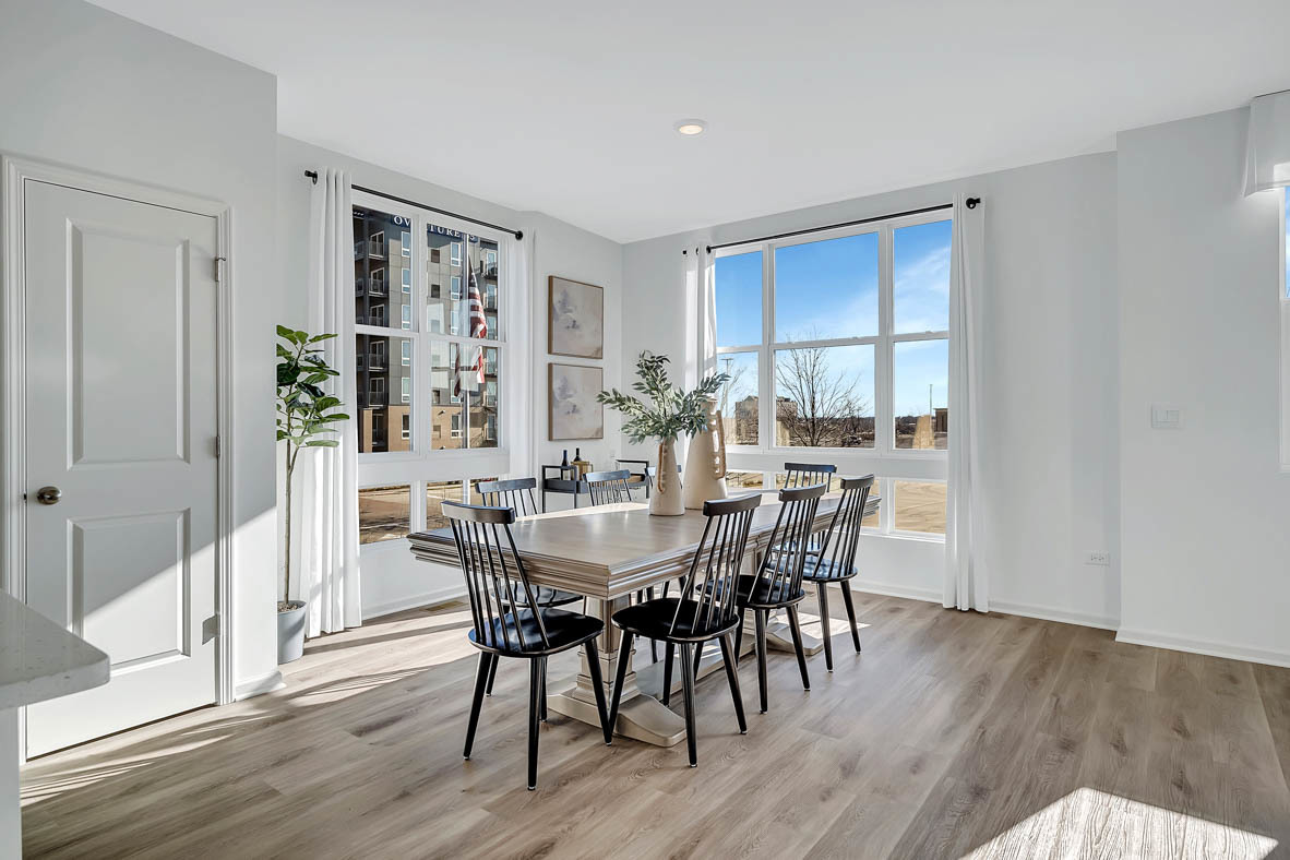 338 Summit Circle Lombard, IL 60148 - Photo 5 of 35 a view of a dining room with furniture and wooden floor