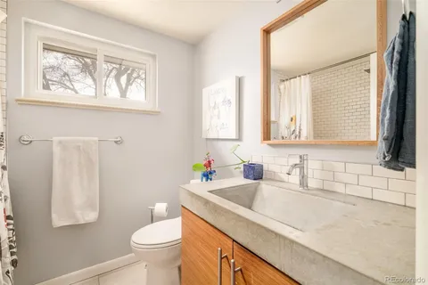 a bathroom with a sink and a toilet