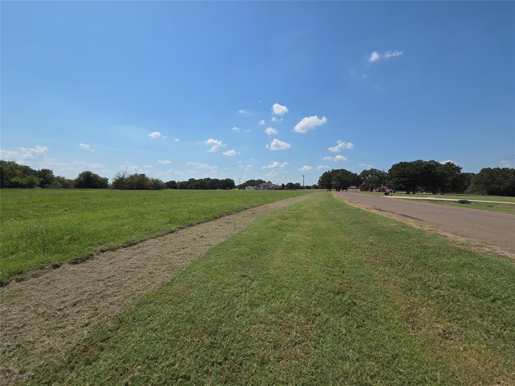 Lot 74 Tonkawa Trail Corsicana, TX 75109 - Photo 6 of 32 a view of a lake in a big yard