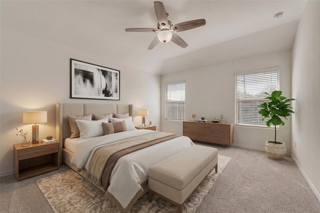 5117 Grayson Ridge Drive Fort Worth, TX 76179 - Photo 2 of 36 a bedroom with a bed and a chandelier