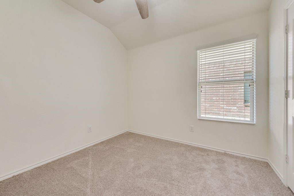 5117 Grayson Ridge Drive Fort Worth, TX 76179 - Photo 26 of 31 bedroom with ceiling fan, brand new carpet and closet