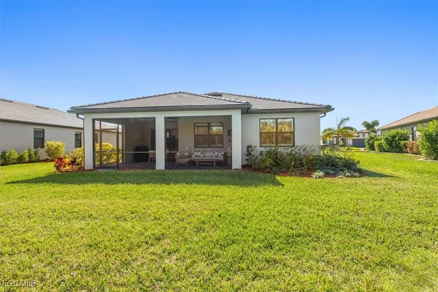 a view of a house with a garden