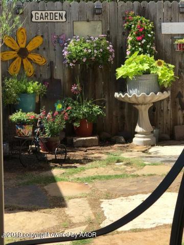 4013 South Travis Street Amarillo, TX 79110 - Photo 20 of 40 a view of a flower garden