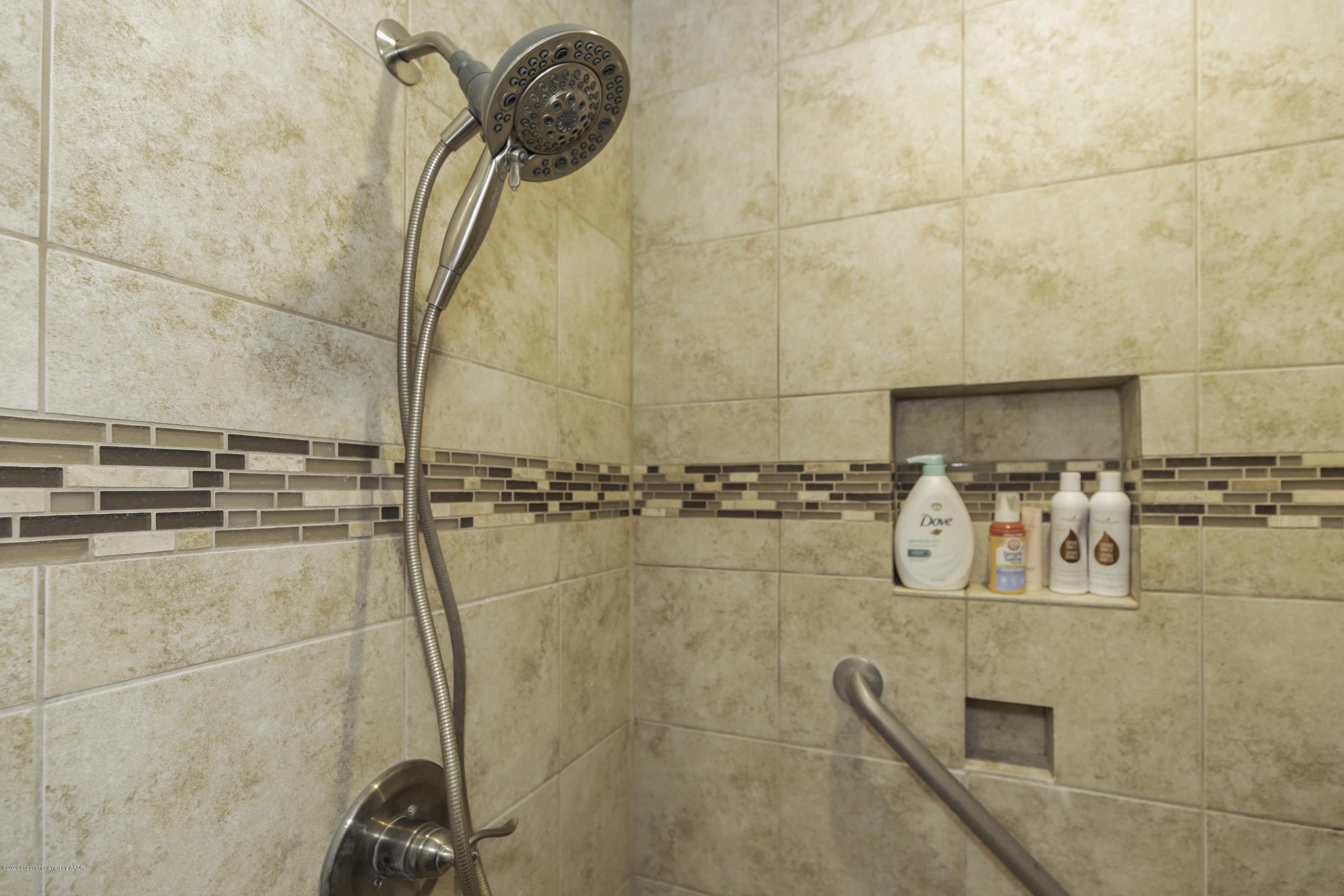 4013 South Travis Street Amarillo, TX 79110 - Photo 35 of 40 a picture of a bathroom with a shower