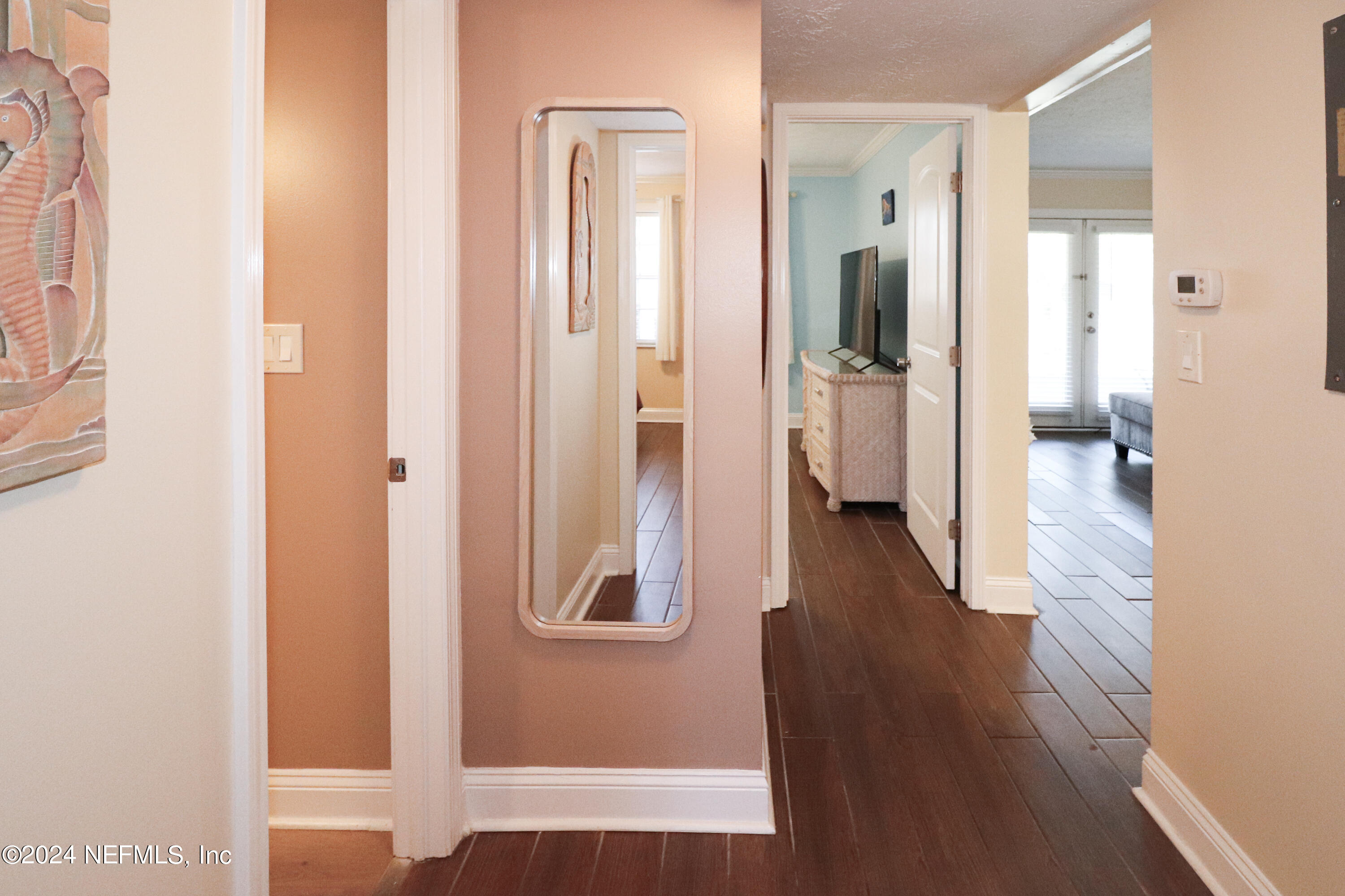 317 Flagler Boulevard, Unit 4A St. Augustine, FL 32080 - Photo 12 of 19 a view of a hallway with wooden floor