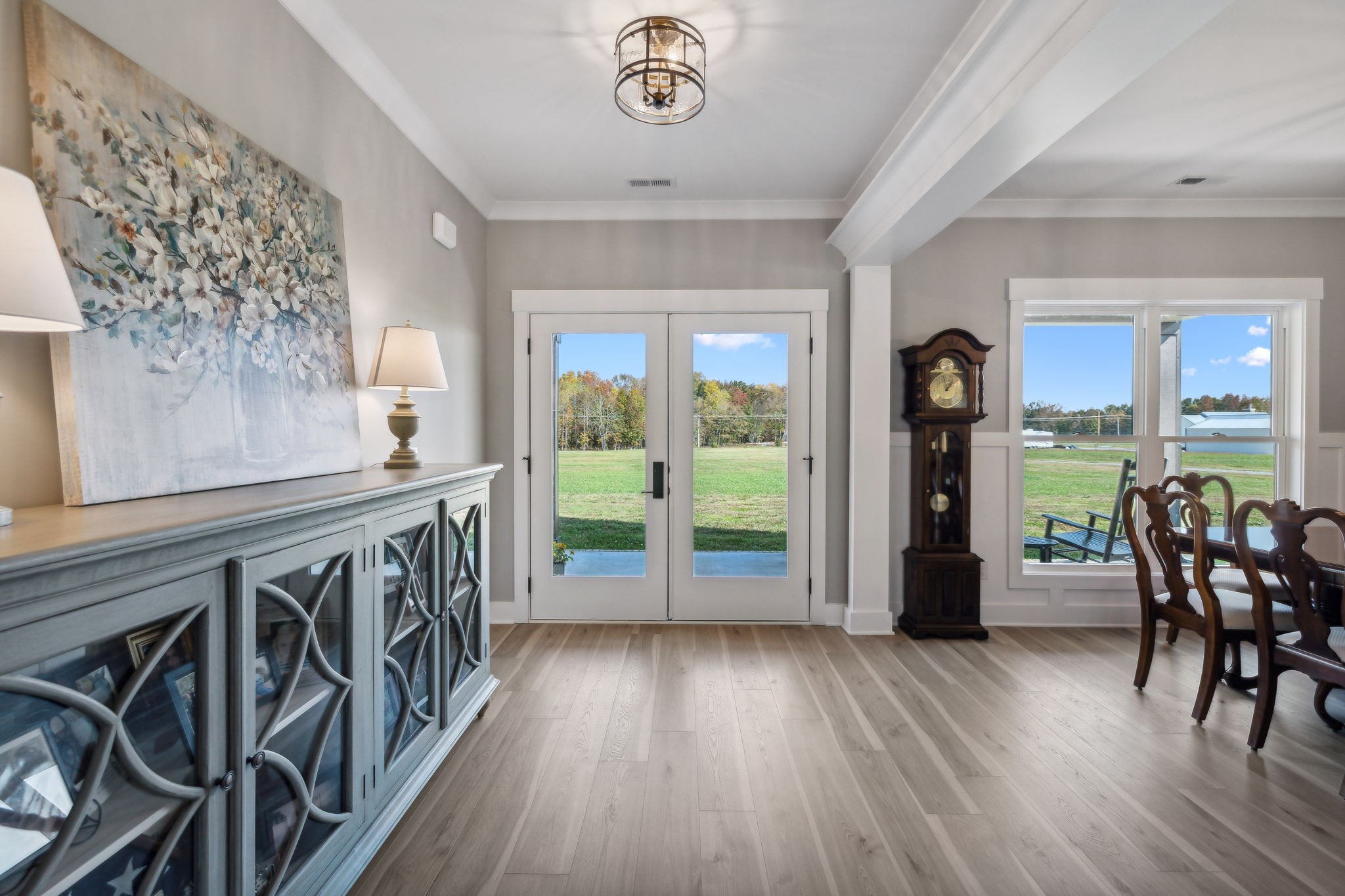 6379 Fredonia Road Manchester, TN 37355 - Photo 6 of 41 a view of a hallway with wooden floor and windows