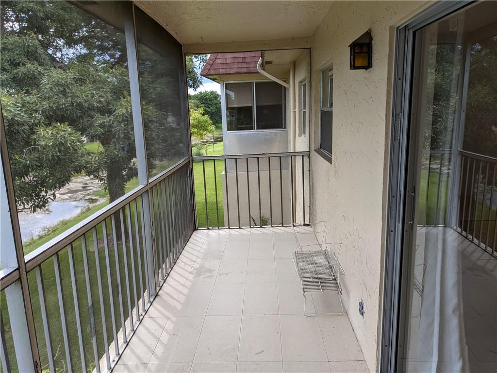 9280 Southwest 3rd Street, Unit 810 Boca Raton, FL 33428 - Photo 18 of 22 a view of a balcony