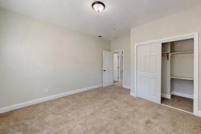 an empty room with closet