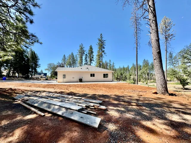 a view of a large space next to a yard