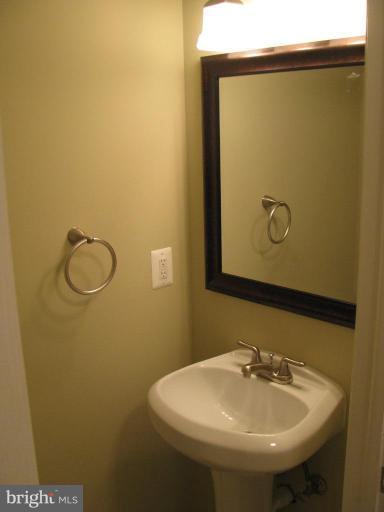 1001 Beech Road Sterling, VA 20164 - Photo 17 of 23 Hall Bath w/ Pedestal Sink
