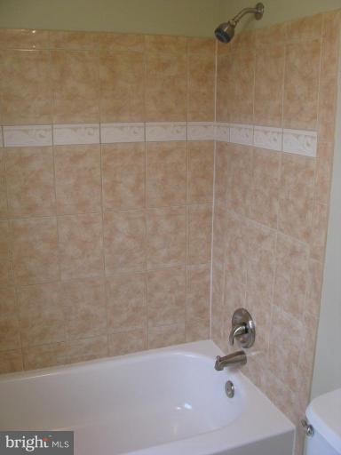1001 Beech Road Sterling, VA 20164 - Photo 19 of 23 Upper Hall Bath Tub/Shower w/ Ceramic Tile