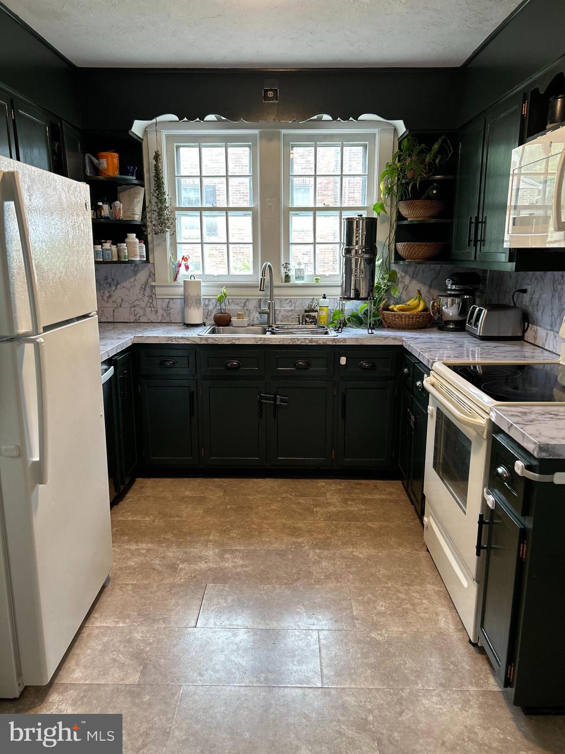 1175 Felton Road Red Lion, PA 17356 - Photo 3 of 16 a kitchen with stainless steel appliances a refrigerator sink and cabinets