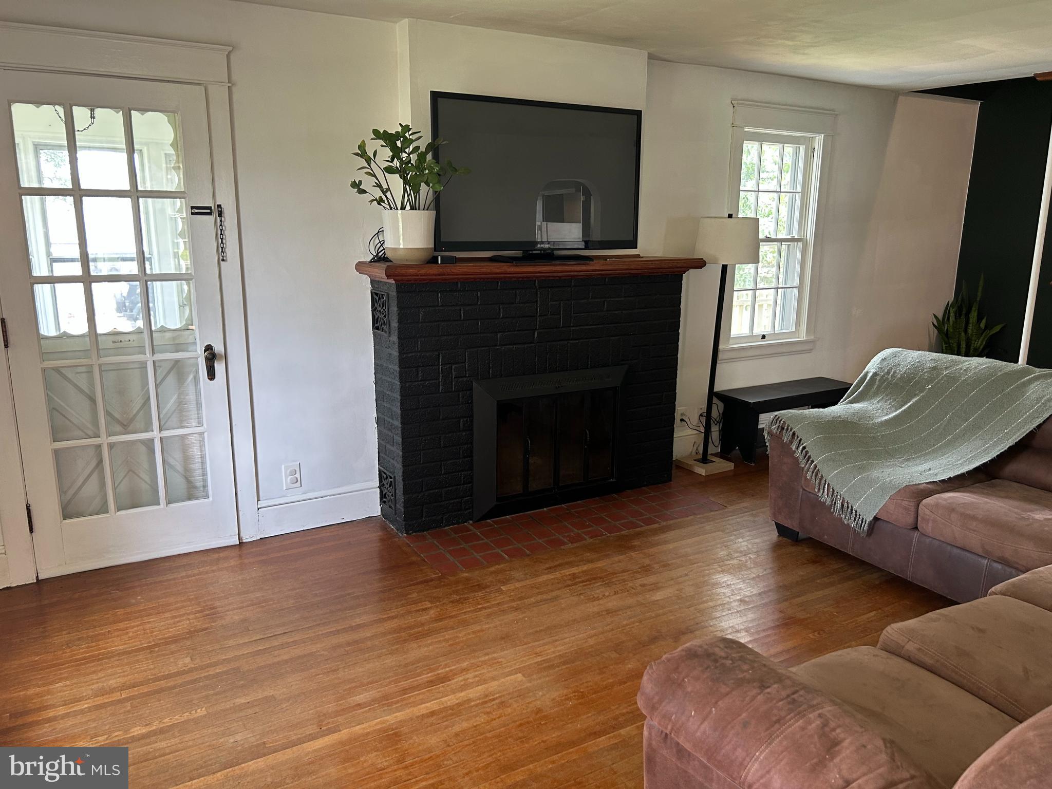1175 Felton Road Red Lion, PA 17356 - Photo 6 of 16 a living room with furniture and a fireplace