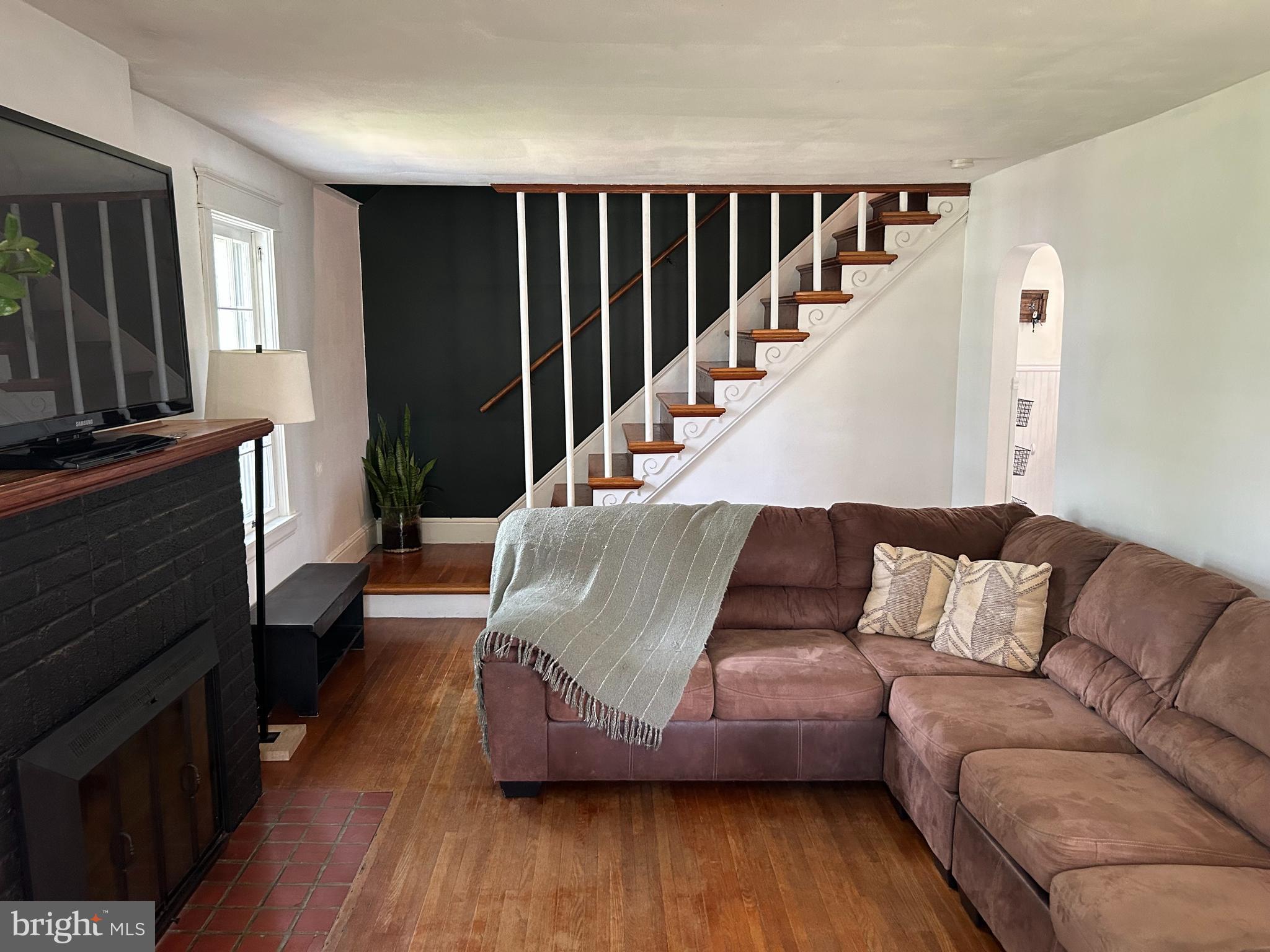 1175 Felton Road Red Lion, PA 17356 - Photo 7 of 16 a living room with furniture and a flat screen tv