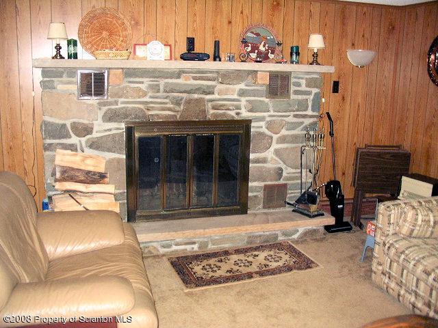 0 Spring Hill Road Sterling, PA 18463 - Photo 19 of 24 a view of front door with couch